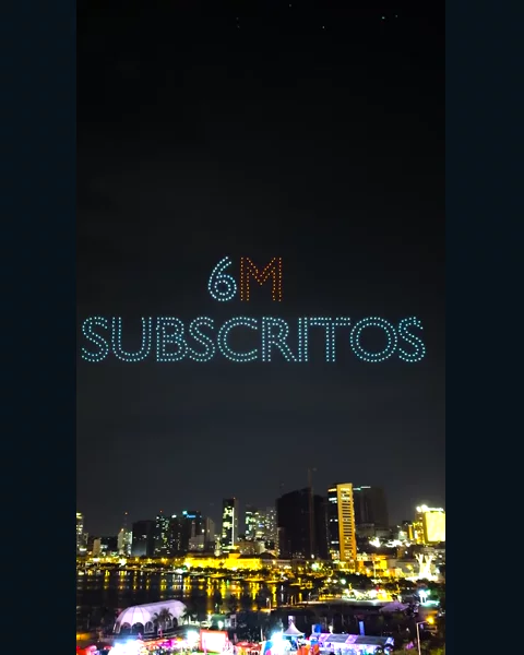 The words 6M SUBSCRITOS written in drone lights